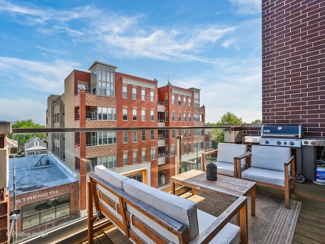 2707 W Belmont Ave Unit 4W, Chicago, IL 60618 - wooden terrace with a grill