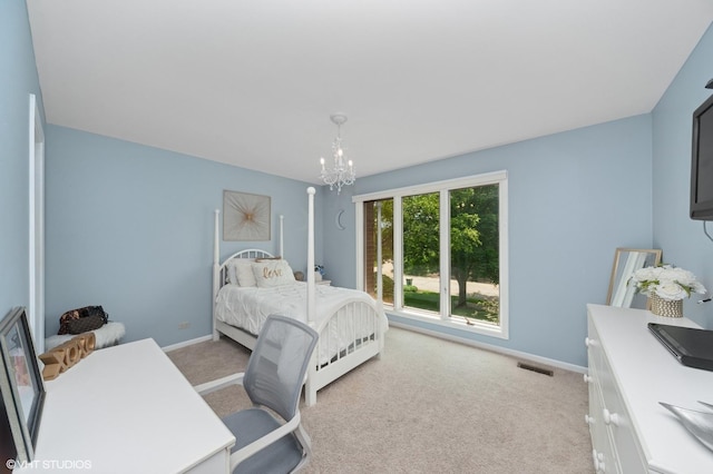 2741 Acacia Ter, Buffalo Grove, IL 60089 - bedroom featuring a chandelier and light carpet