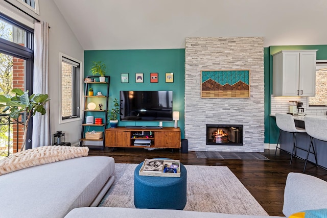 3047 N Racine Ave Unit 3, Chicago, IL 60657 - living area with dark wood-style floors, a fireplace, and vaulted ceiling