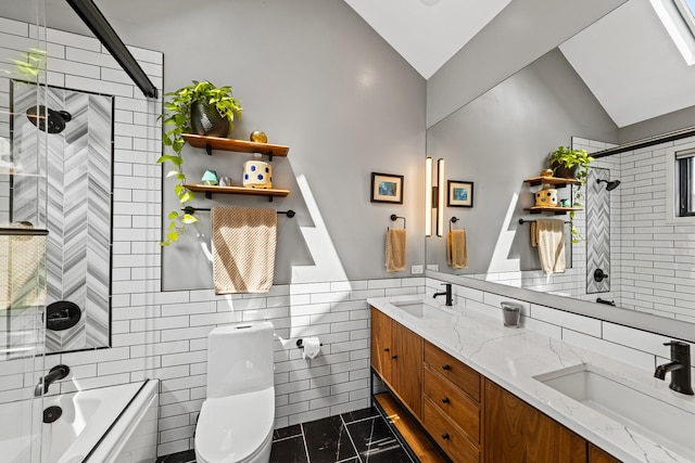 3047 N Racine Ave Unit 3, Chicago, IL 60657 - full bathroom with tile walls, lofted ceiling, shower / bathtub combination, double vanity, and wainscoting