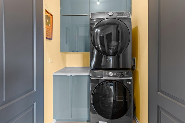 3047 N Racine Ave Unit 3, Chicago, IL 60657 - washroom featuring estacked washer and dryer and cabinet space