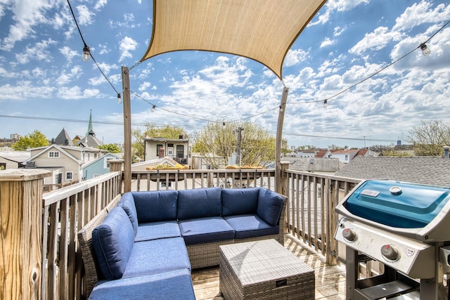 3047 N Racine Ave Unit 3, Chicago, IL 60657 - wooden terrace with grilling area, outdoor lounge area, and a residential view