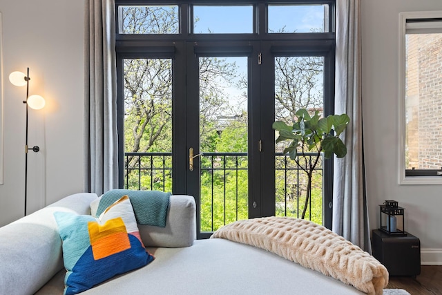 3047 N Racine Ave Unit 3, Chicago, IL 60657 - bedroom featuring access to outside, wood finished floors, and multiple windows