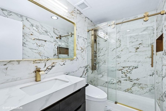 175 E Delaware Pl Unit 6021, Chicago, IL 60611 - full bathroom featuring tile walls, a marble finish shower, and vanity