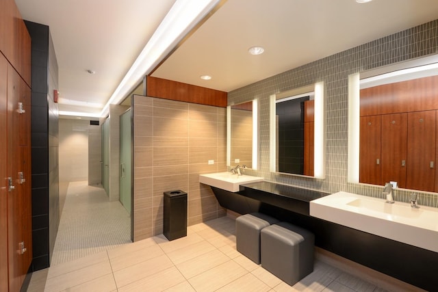 175 E Delaware Pl Unit 6021, Chicago, IL 60611 - bathroom featuring tile walls, tile patterned flooring, recessed lighting, and double vanity