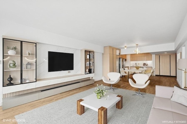 175 E Delaware Pl Unit 6021, Chicago, IL 60611 - living room featuring wood finished floors