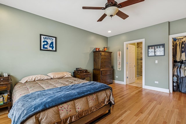 4660 N Winthrop Ave Unit 1N, Chicago, IL 60640 - bedroom featuring a walk in closet, a closet, light wood finished floors, recessed lighting, and connected bathroom