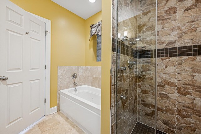 4660 N Winthrop Ave Unit 1N, Chicago, IL 60640 - full bathroom featuring a garden tub, a shower stall, and tile patterned floors