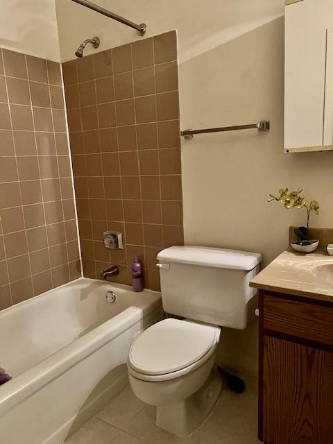640 S Federal St Unit 603, Chicago, IL 60605 - bathroom with tile patterned flooring, vanity, and shower / tub combination