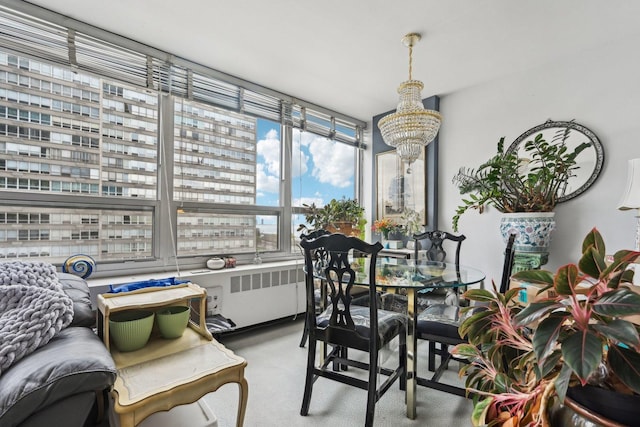 4800 S Chicago Beach Dr Unit 702S, Chicago, IL 60615 - sunroom / solarium featuring a chandelier and radiator