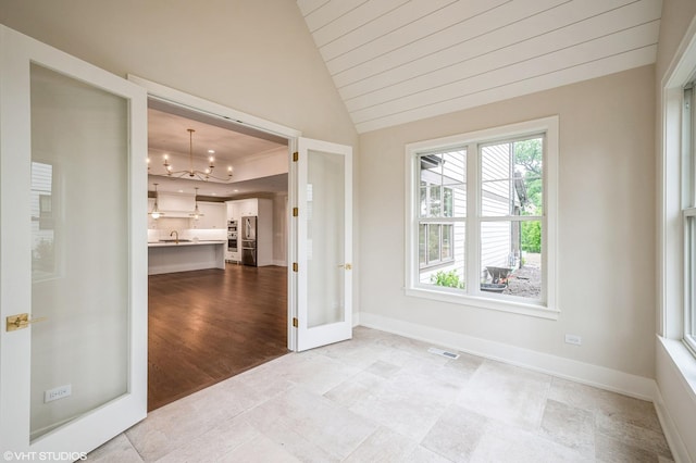 5903 Timber Trails Blvd, Western Springs, IL 60558 - spare room with a chandelier and lofted ceiling