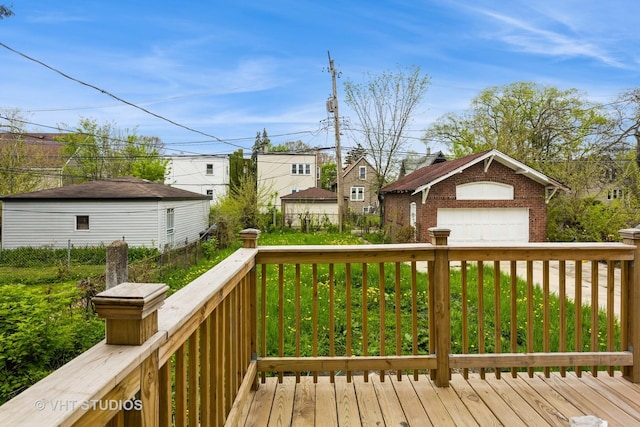 32 W 109th Pl, Chicago, IL 60628 - wooden deck with a detached garage and an outbuilding