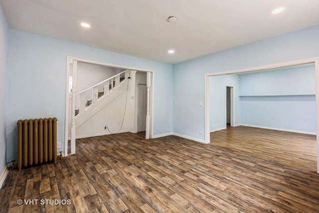 32 W 109th Pl, Chicago, IL 60628 - unfurnished bedroom with radiator heating unit, wood finished floors, and recessed lighting