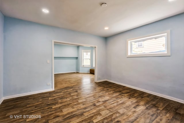 32 W 109th Pl, Chicago, IL 60628 - unfurnished bedroom with dark wood-type flooring and recessed lighting