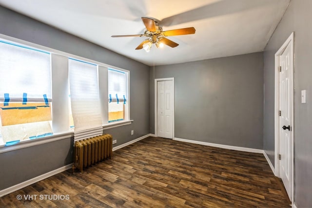 32 W 109th Pl, Chicago, IL 60628 - empty room featuring radiator heating unit, ceiling fan, and wood finished floors