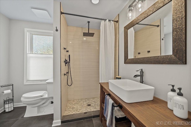 704 Cedar Ave, Saint Charles, IL 60174 - bathroom with a tile shower, vanity, and tile patterned flooring