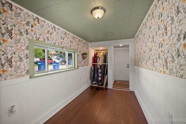 704 Cedar Ave, Saint Charles, IL 60174 - corridor with wallpapered walls, hardwood / wood-style flooring, a wainscoted wall, and ornamental molding