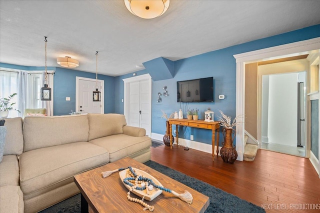 704 Cedar Ave, Saint Charles, IL 60174 - living area featuring hardwood / wood-style flooring and baseboards