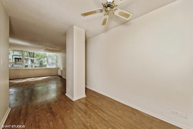 2728 N Hampden Ct Unit 103, Chicago, IL 60614 - spare room featuring wood finished floors and a ceiling fan