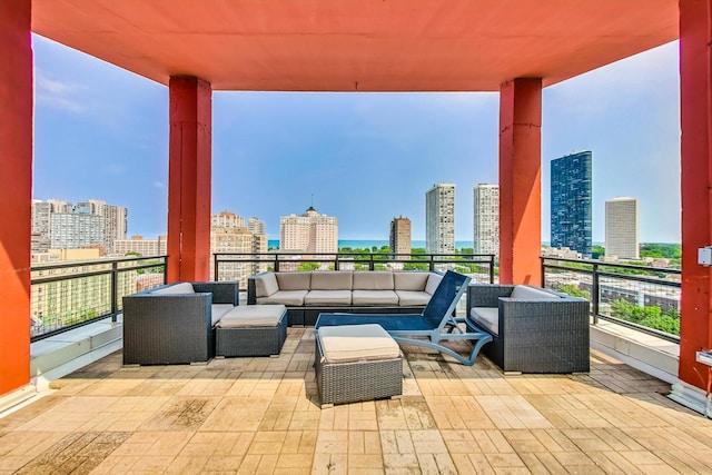1122 W Catalpa Ave Unit 815, Chicago, IL 60640 - patio / terrace with a skyline view, an outdoor living space, and a water view