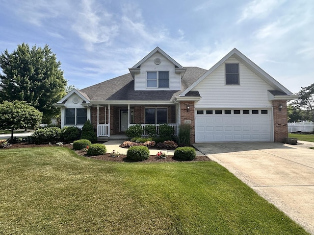597 Barry Turn, Manteno, IL 60950 - traditional-style home featuring brick siding, concrete driveway, and a front lawn