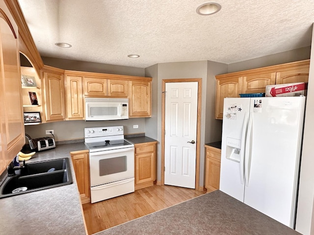 597 Barry Turn, Manteno, IL 60950 - kitchen featuring white appliances, light wood-style floors, recessed lighting, a textured ceiling, and light brown cabinets
