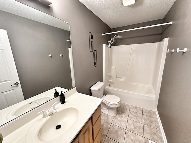 597 Barry Turn, Manteno, IL 60950 - full bathroom with a textured ceiling, vanity, shower / bath combination, and tile patterned flooring
