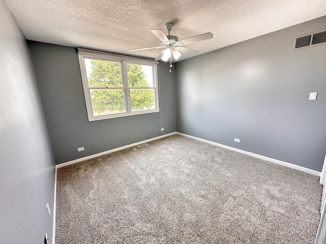 597 Barry Turn, Manteno, IL 60950 - carpeted empty room with a ceiling fan and a textured ceiling