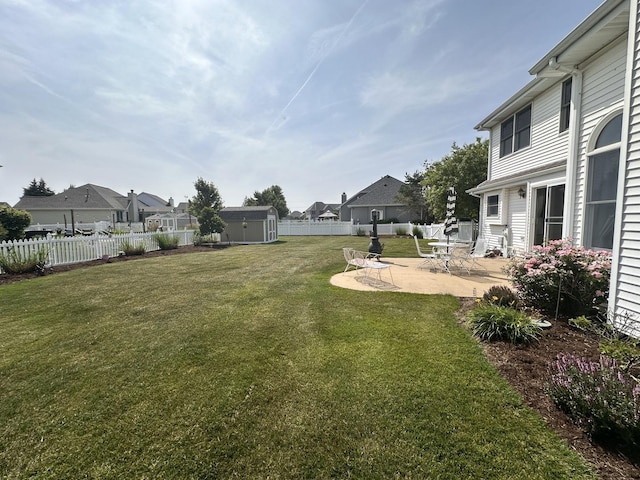 597 Barry Turn, Manteno, IL 60950 - fenced backyard with a residential view, a patio, and a shed