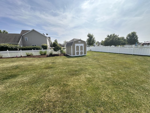 597 Barry Turn, Manteno, IL 60950 - fenced backyard with a storage unit