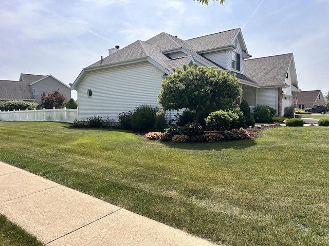 597 Barry Turn, Manteno, IL 60950 - view of side of home featuring roof with shingles