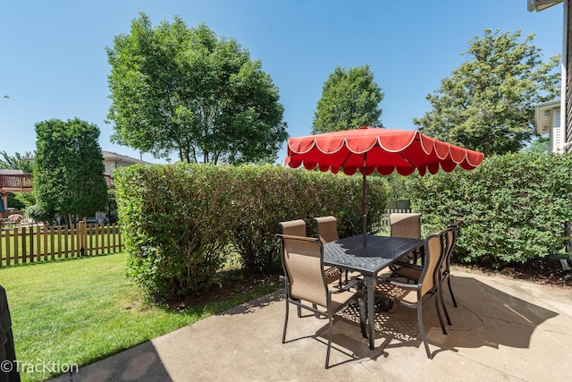 6665 Foxtree Ave, Woodridge, IL 60517 - fenced backyard with a patio and outdoor dining area