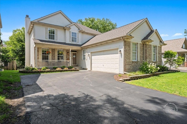 3210 Larrabee Dr, Geneva, IL 60134 - traditional home featuring a porch, asphalt driveway, a garage, a chimney, and a front yard