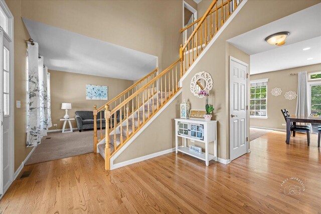 3210 Larrabee Dr, Geneva, IL 60134 - foyer entrance with stairs and wood finished floors