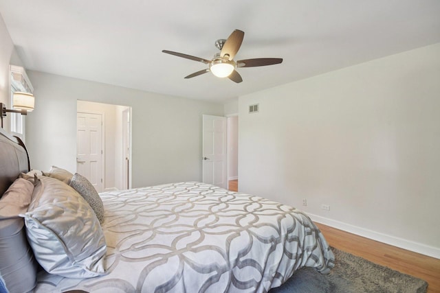 5085 Dukesberry Ln, Hoffman Estates, IL 60010 - bedroom with wood finished floors and a ceiling fan