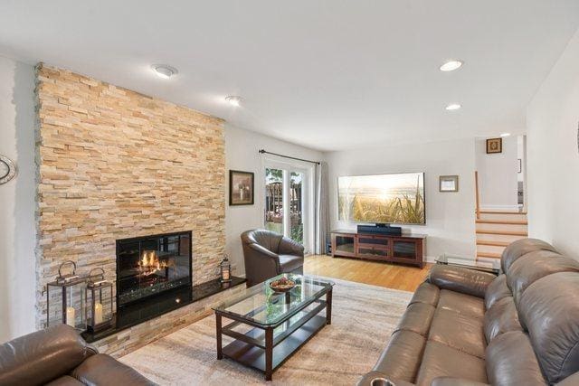 5085 Dukesberry Ln, Hoffman Estates, IL 60010 - living area featuring wood finished floors, a fireplace, stairway, and recessed lighting