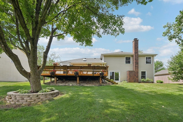 5085 Dukesberry Ln, Hoffman Estates, IL 60010 - rear view of house with a deck, a chimney, stairs, and a yard