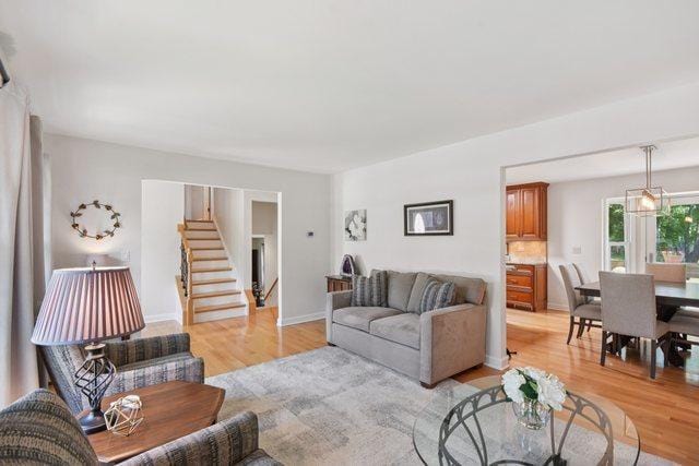 5085 Dukesberry Ln, Hoffman Estates, IL 60010 - living room featuring stairway and light wood finished floors