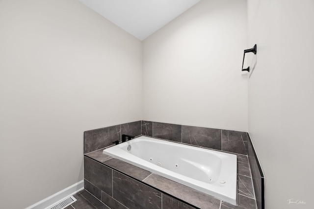 9704 Captains Dr, Algonquin, IL 60102 - bathroom featuring a tub with jets and lofted ceiling