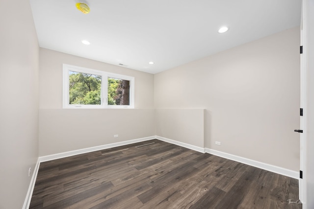 9704 Captains Dr, Algonquin, IL 60102 - empty room featuring dark wood-style flooring and recessed lighting