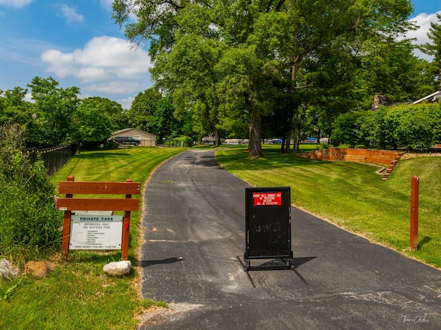 9704 Captains Dr, Algonquin, IL 60102 - view of asphalt driveway with view of scattered trees