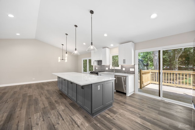 9704 Captains Dr, Algonquin, IL 60102 - kitchen with stainless steel appliances, gray cabinets, dark wood finished floors, white cabinetry, and a kitchen island