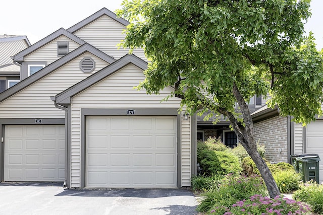 377 Grissom Ct, Hoffman Estates, IL 60169 - view of front of property featuring asphalt driveway and an attached garage