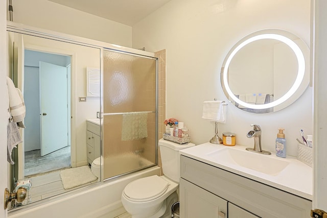 377 Grissom Ct, Hoffman Estates, IL 60169 - bathroom featuring vanity and combined bath / shower with glass door