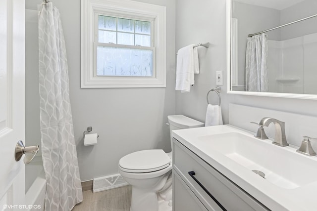 2721 Joseph Ave, Des Plaines, IL 60018 - bathroom featuring vanity, wood finished floors, and shower / bathtub combination with curtain