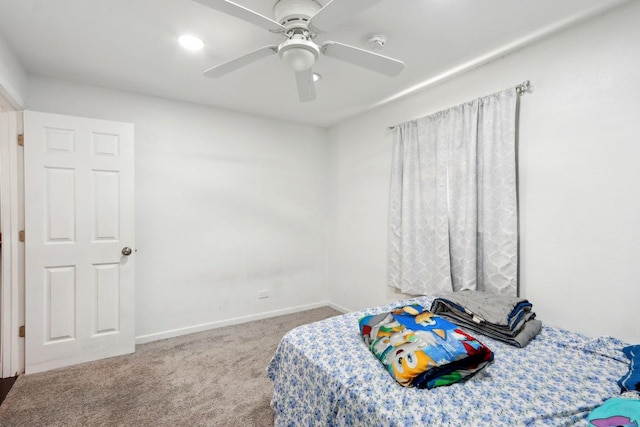 2023 Kristan Ave, North Chicago, IL 60064 - carpeted bedroom with baseboards and a ceiling fan