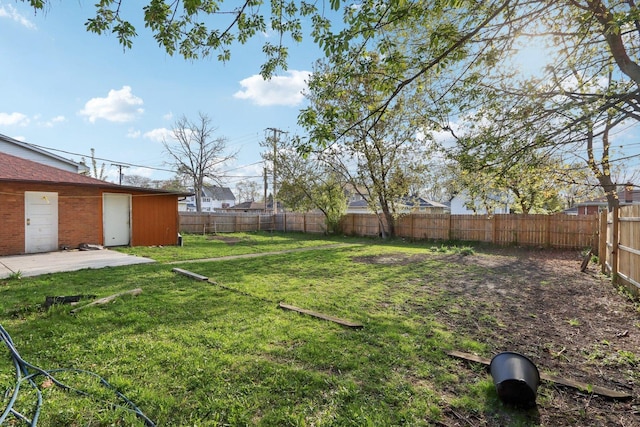 2023 Kristan Ave, North Chicago, IL 60064 - fenced backyard featuring a patio
