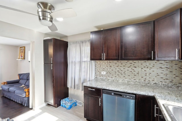 2023 Kristan Ave, North Chicago, IL 60064 - kitchen featuring stainless steel dishwasher, freestanding refrigerator, decorative backsplash, dark brown cabinets, and a ceiling fan