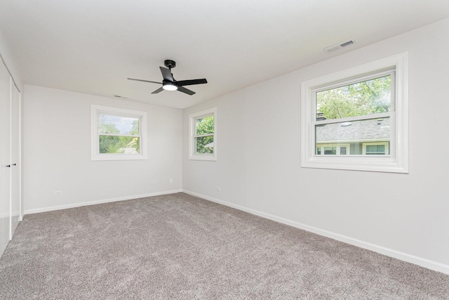 208 Webster Ln, Schaumburg, IL 60193 - unfurnished bedroom featuring carpet flooring and ceiling fan