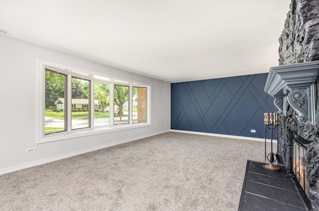 208 Webster Ln, Schaumburg, IL 60193 - unfurnished living room featuring a fireplace, carpet, and an accent wall